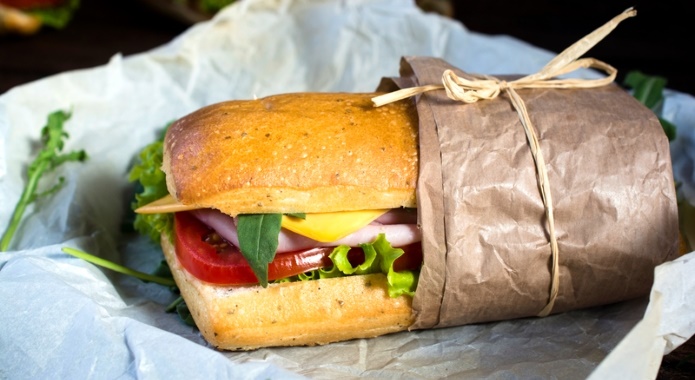 sandwich in big paper package