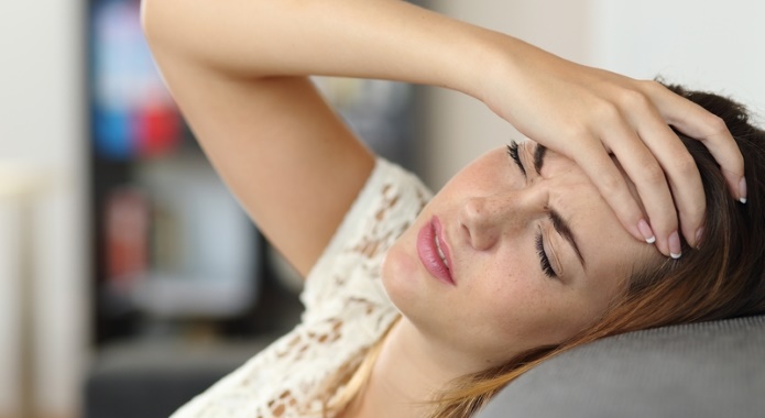 young woman with headache